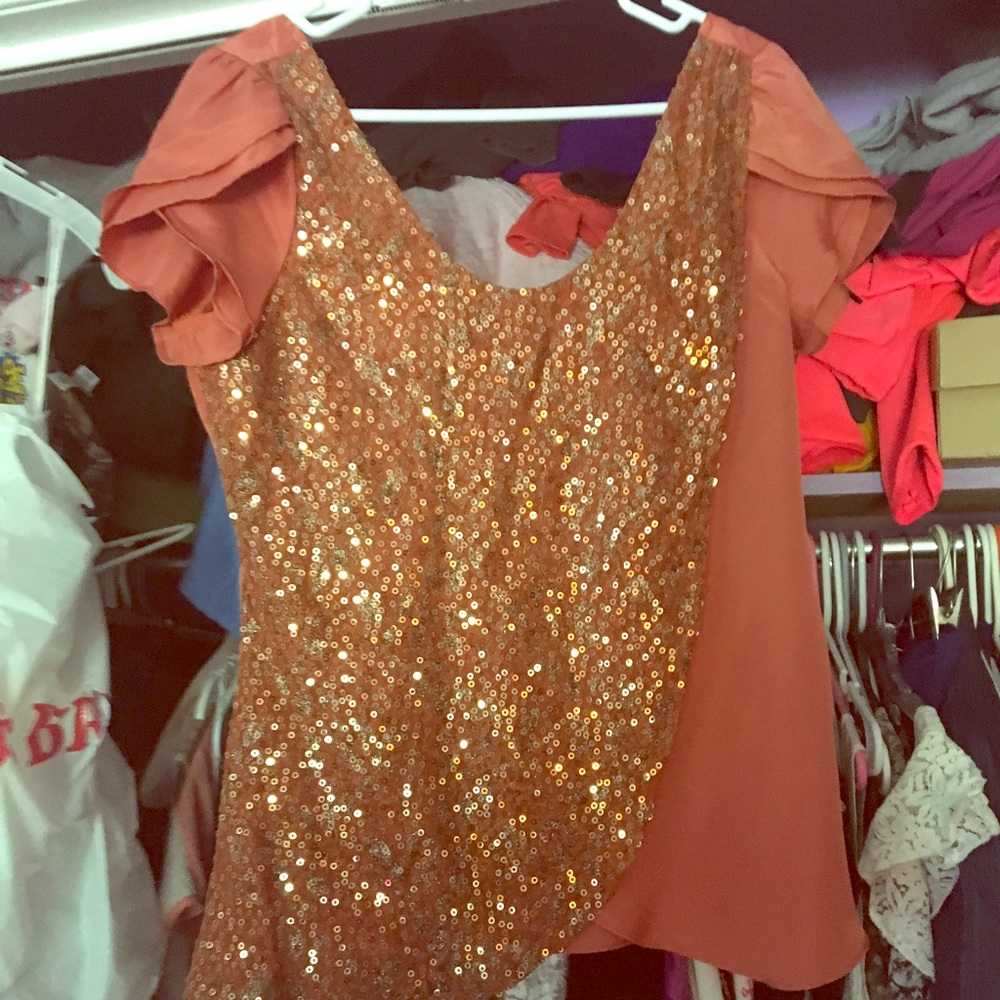 Size M satin/sequin top.